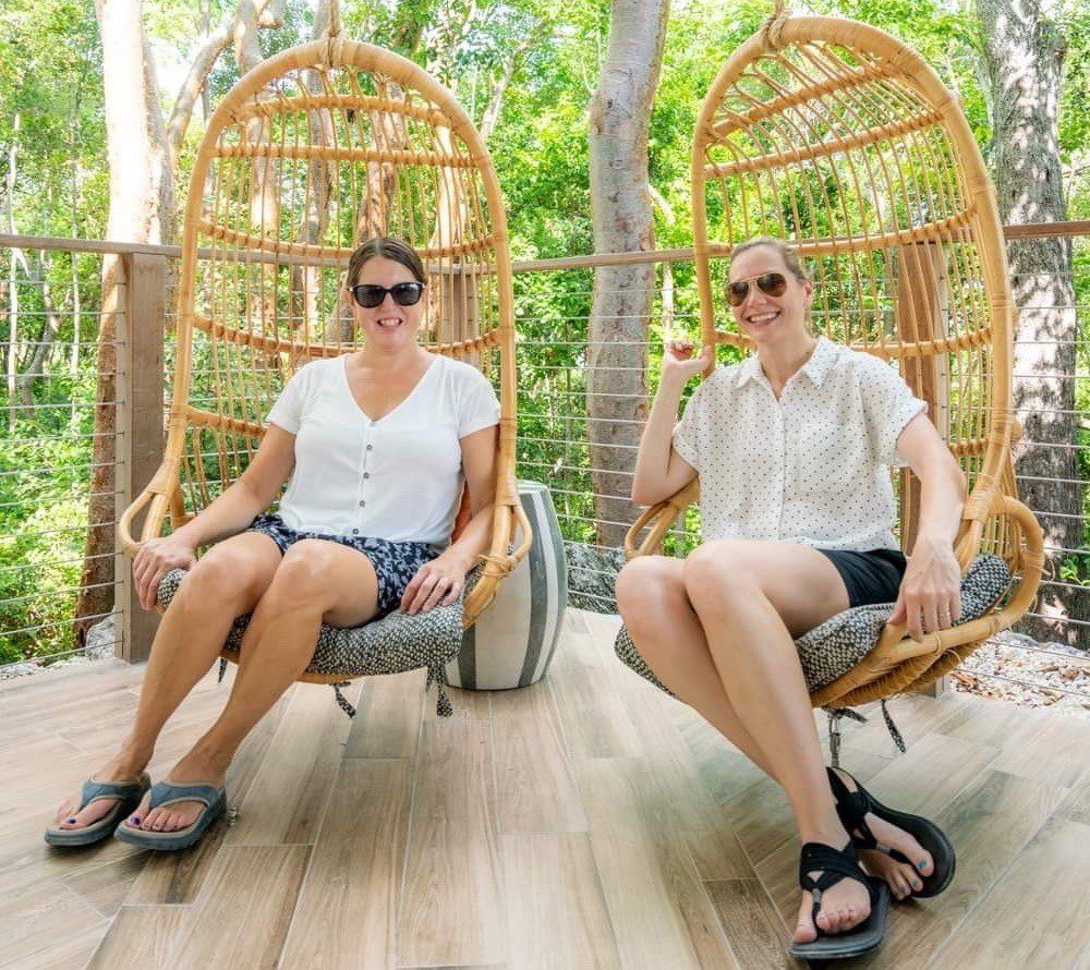 Kim and Tamara on swing chairs