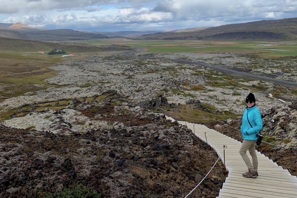 Tamara walking down stairs of volcanic crater