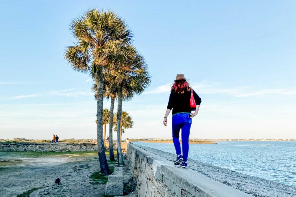 Keryn walking on wall at Castillo de San Marcos