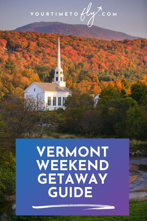 Vermont weekend getaway guide with white church in backdrop of mountains with orange and red leaves on trees