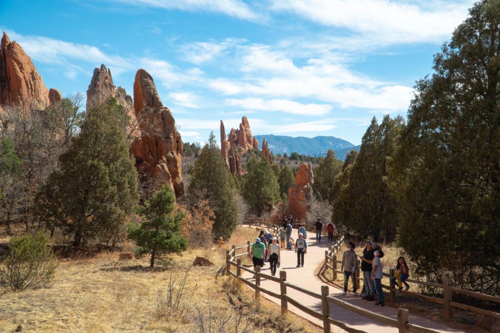 People on a path curving through Garden of the Gods Park