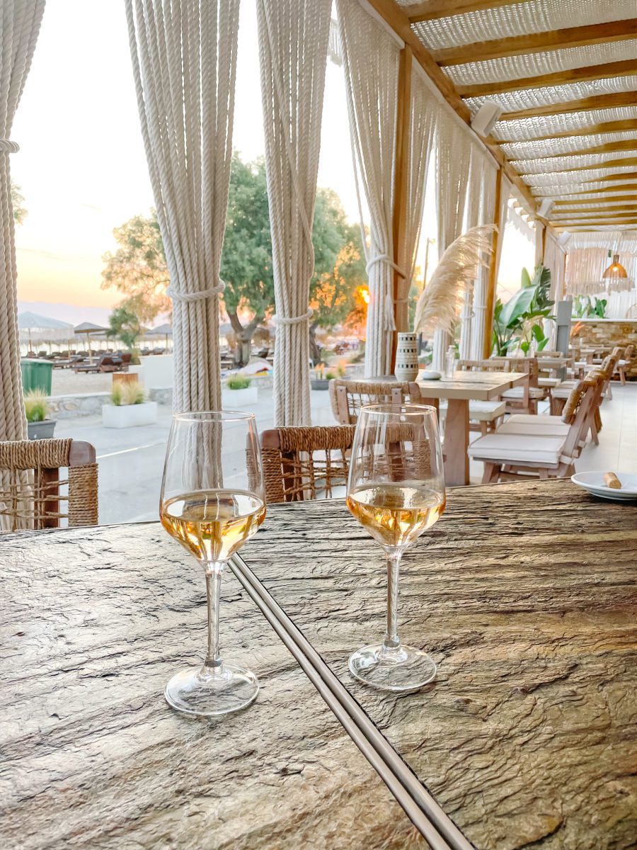 Two wine glasses on a table in the Virtu Suites restaurant