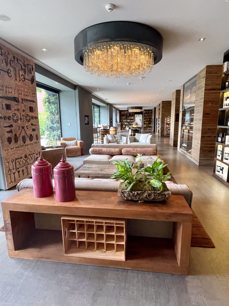 Lounge area with couches and wine bar at the Six Senses Douro Valley