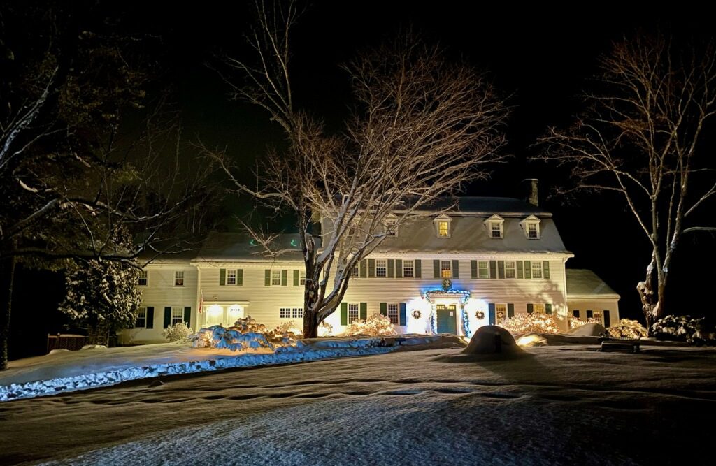 Adair Country Inn at night with holiday decor