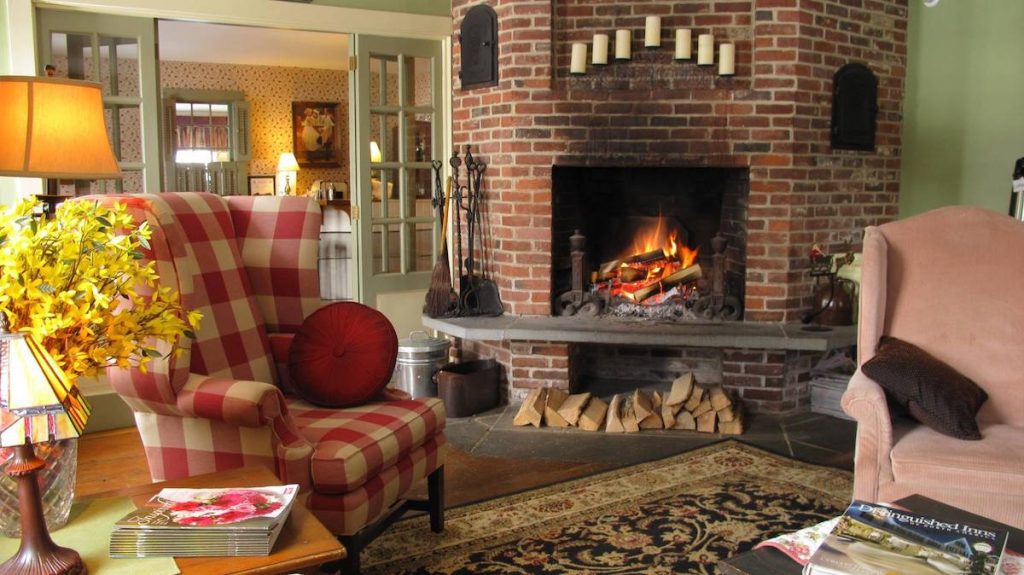 Lobby chairs and fireplace at the Christmas Farm inn