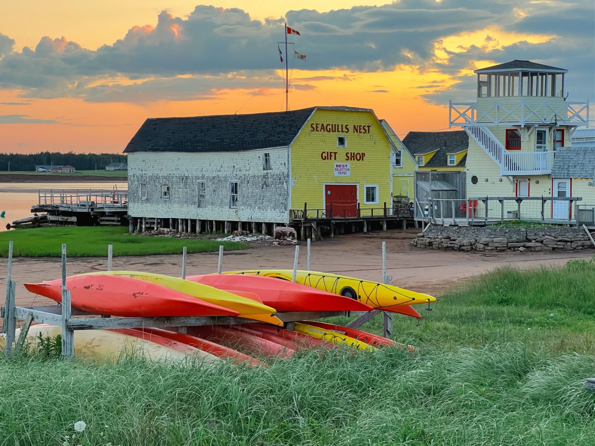 North Rustico harbor gift shop and kayaks at sunset