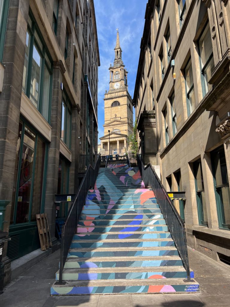 Painted stairs and church steeple in Newcastle