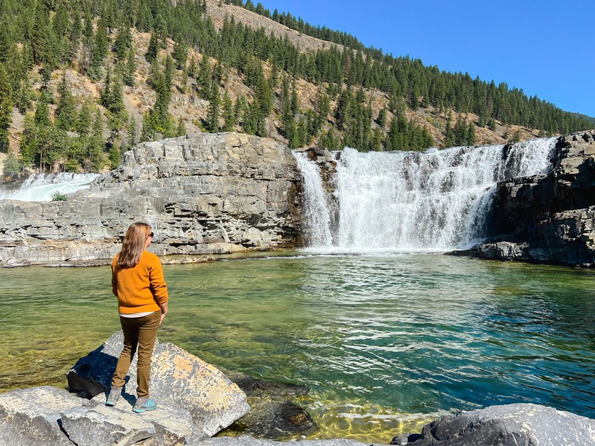 Tamara standing in front of Kootenai Falls