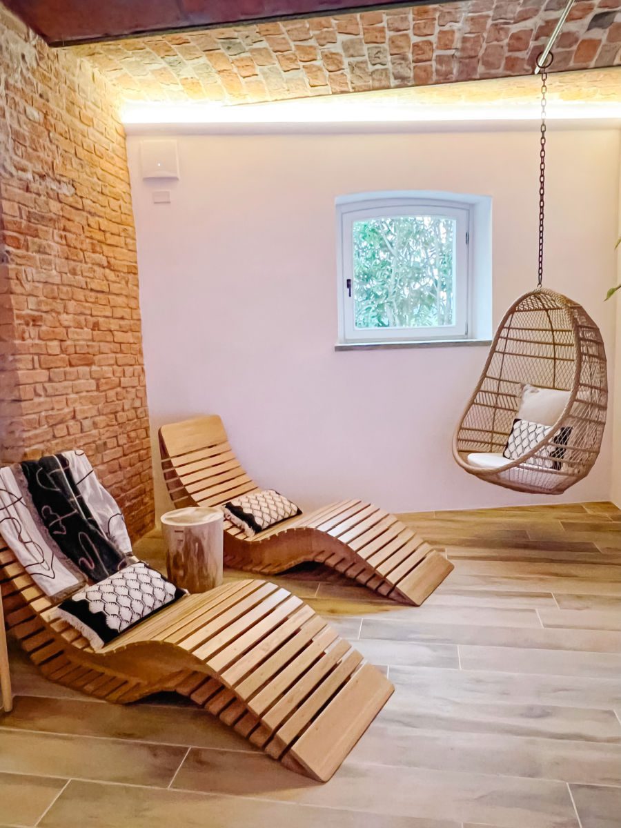 spa wood lounge chairs and hanging egg chair