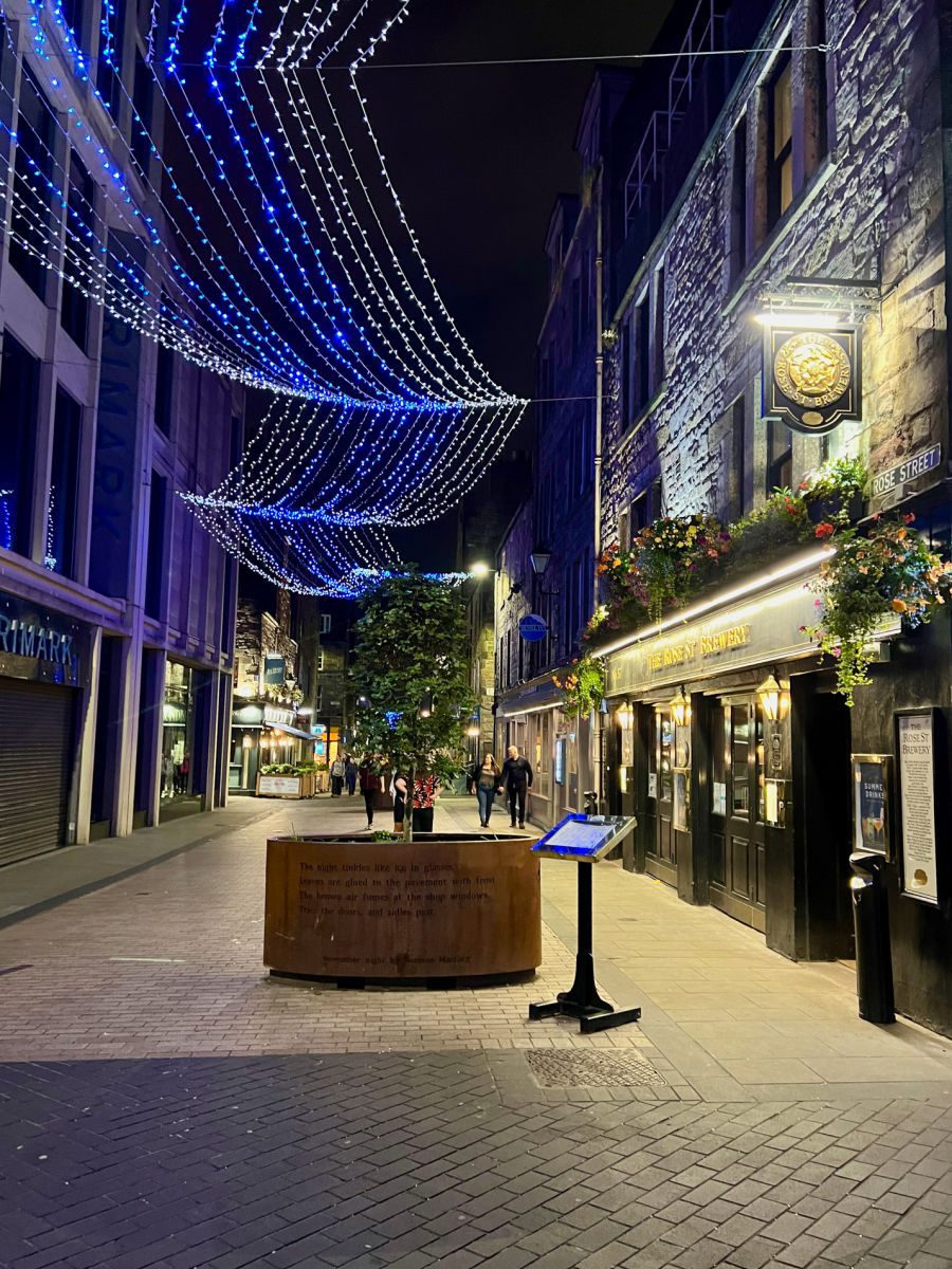 Rose Street with string lights at night