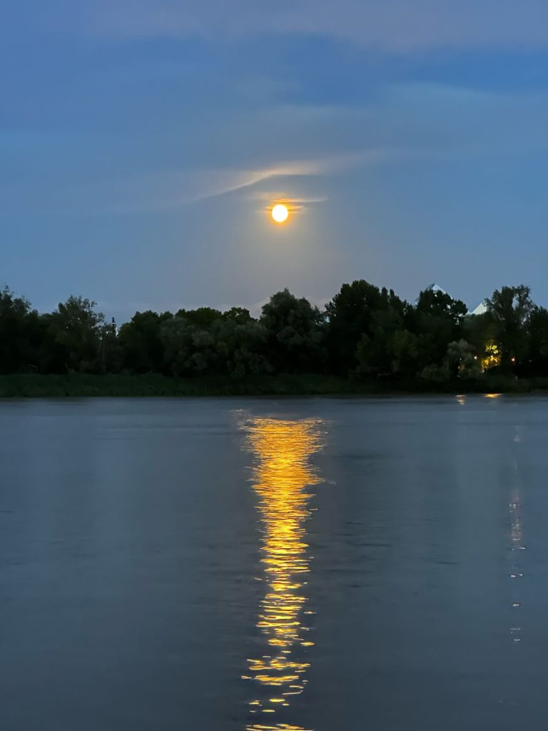 Moon reflecting on the wat