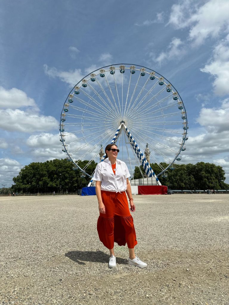Tamara in front of Ferris wheel in Bordeaux