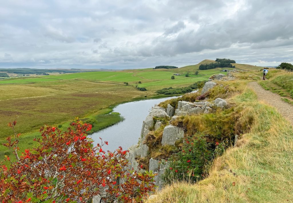Lake below cliff on Hadrian's Wall Path in England