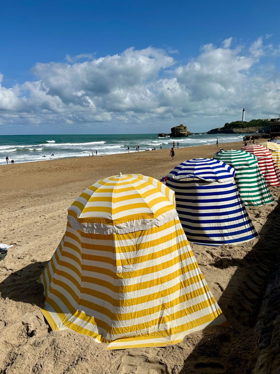 Striped beach umbrellas on Grand Plage in Biarritz
