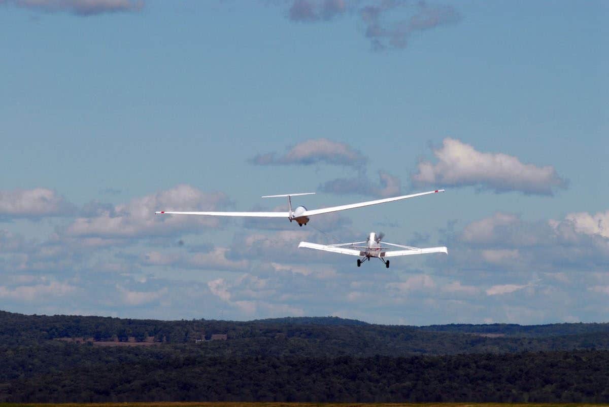 glider being pulled by a plane