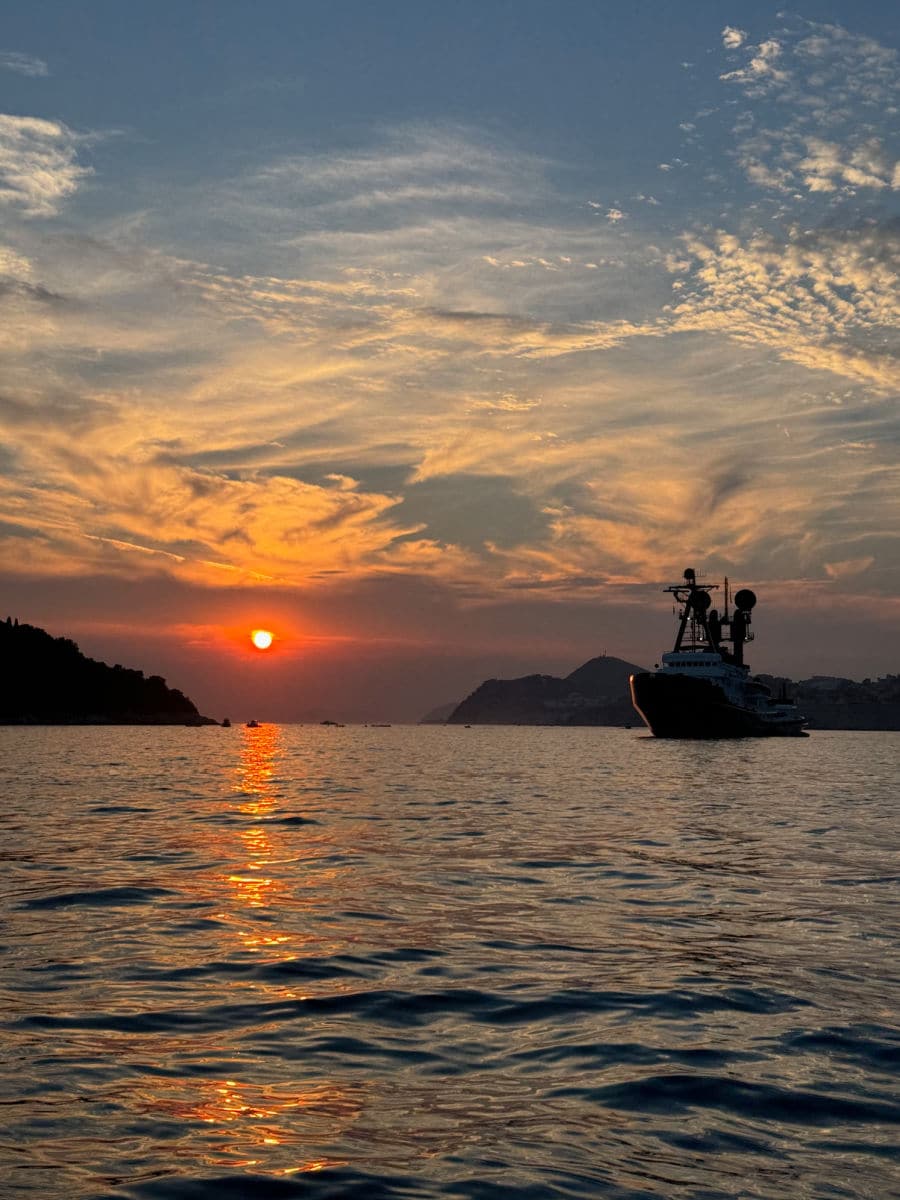 sunset and yacht by Dubrovnik