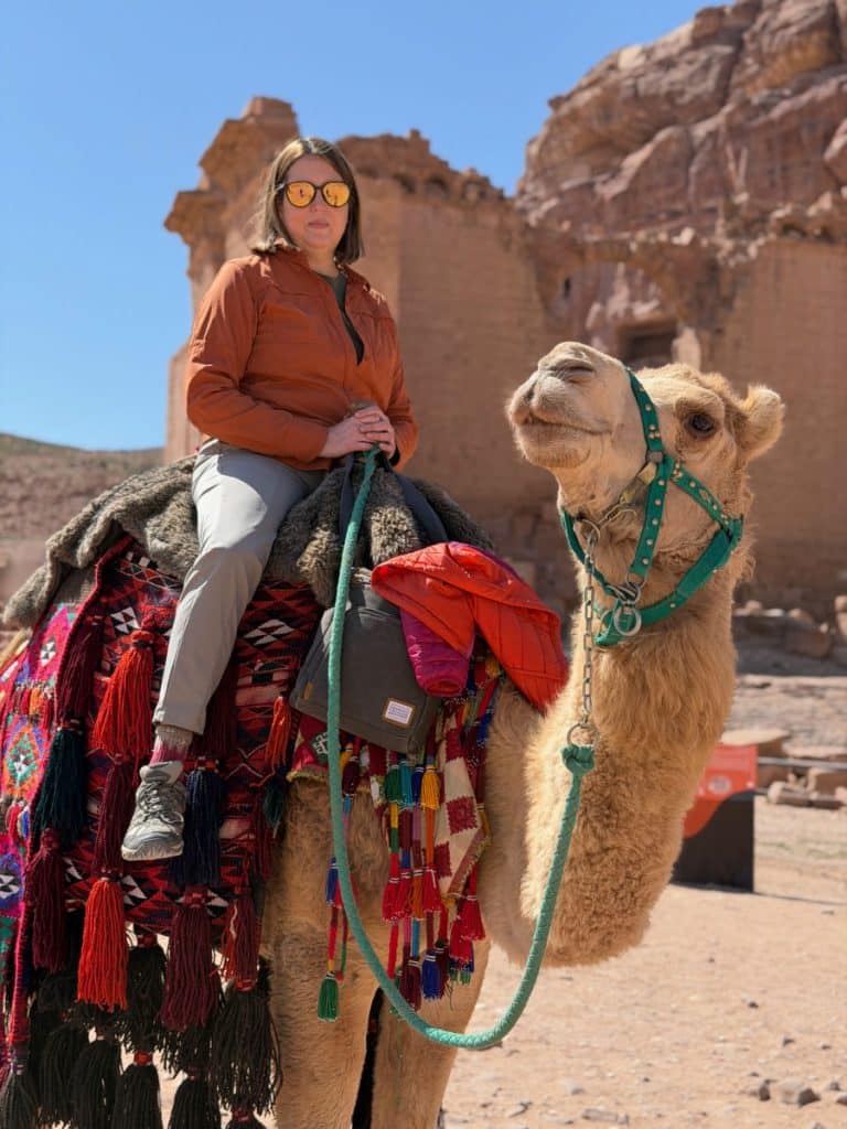 Tamara on a camel in Petra