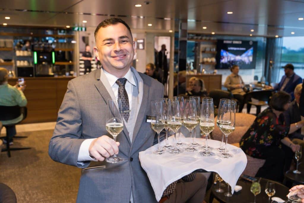 Scenic Opal butler with champagne