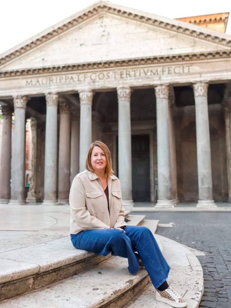 Tamara Gruber sitting on steps by fountain in front of the Pantheon in Rome